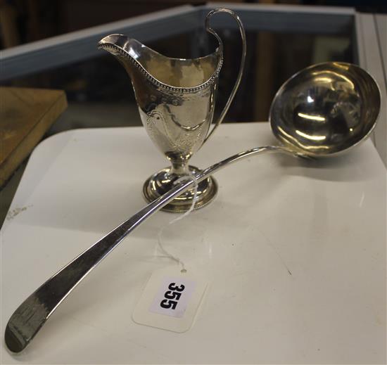 George III engraved silver helmet-shaped cream jug, London 1783 (Charles Hougham) & a George III silver ladle